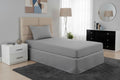 Gray waterproof quilted single mattress protector by Maison Charlo, with soft bedding fabric and secure fitted edges.