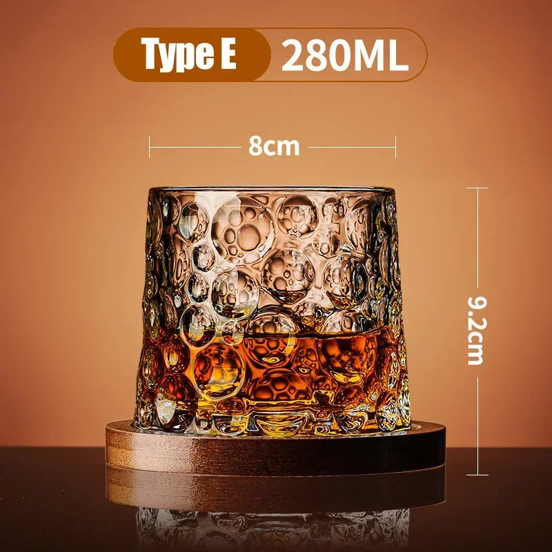 Veltora crystal whiskey tumbler with rotating base, elegant wine and brandy glass for bar and home drinkware.