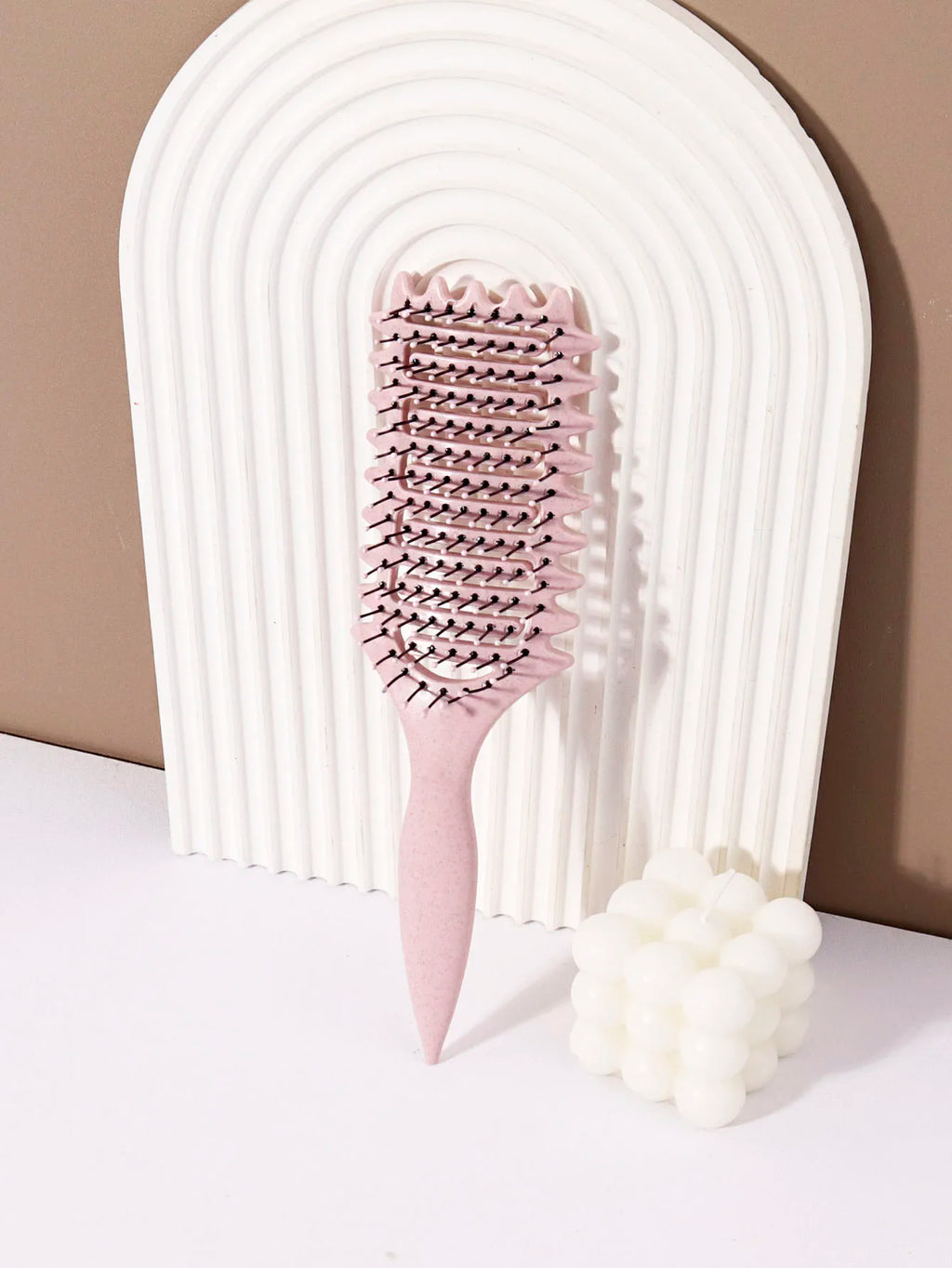 Veltora curling styling brush with hollow massage comb, nylon mane, ABS plastic handle, designed for real hair wigs and styling.