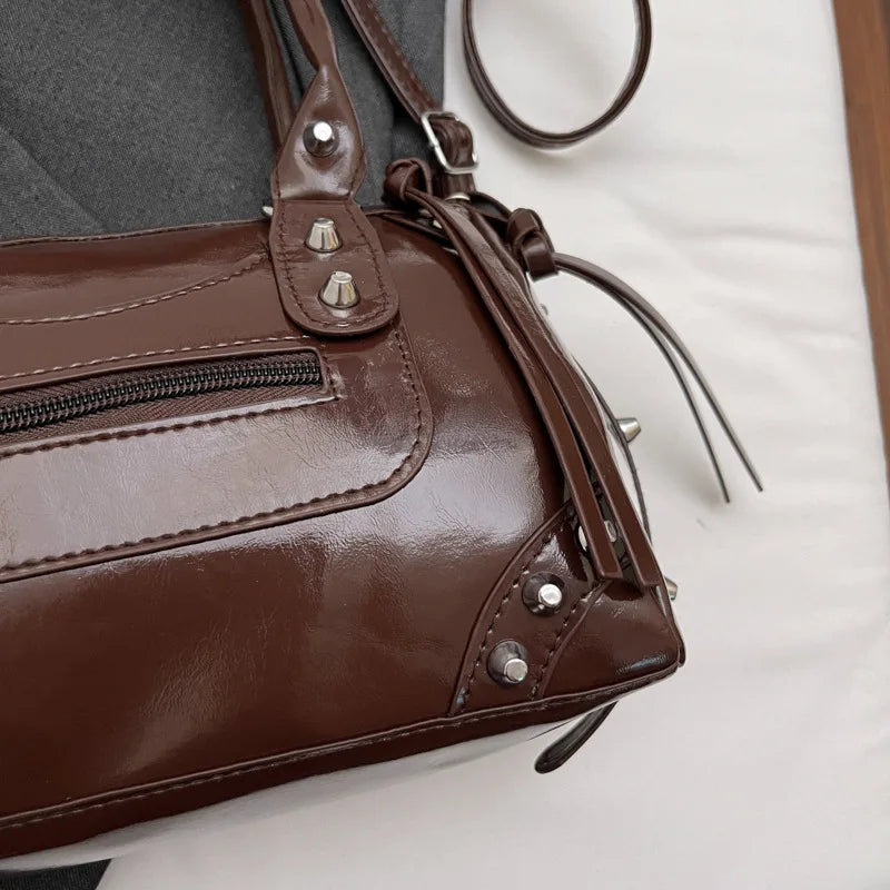 Veltora large capacity pillow bag with fashion rivets, suitable for bowling or motorcycle use, featuring a single shoulder crossbody strap.