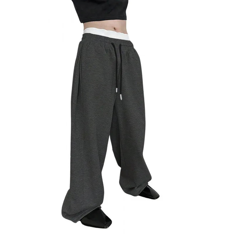 Men's solid color winter pants by Veltora, drawstring waist, straight wide-leg fit, with pockets, versatile for sports and casual wear.