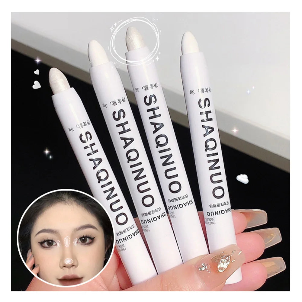 Veltora matte eyeshadow stick and white eyeliner with shimmer silver highlighter pen, displayed with product details on a neutral background.