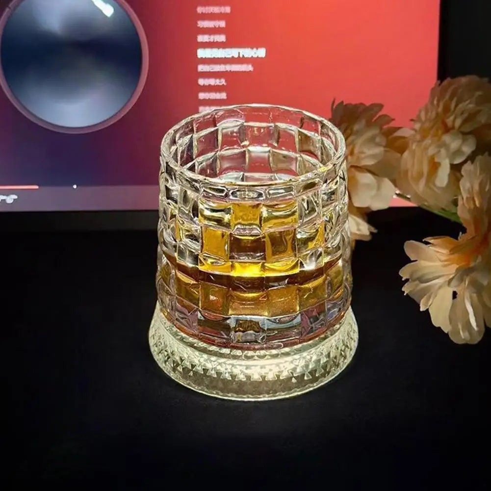 Veltora 260ml rotating crystal whiskey glass with intricate relief design, includes base and straight drink mold for liquor or beer.