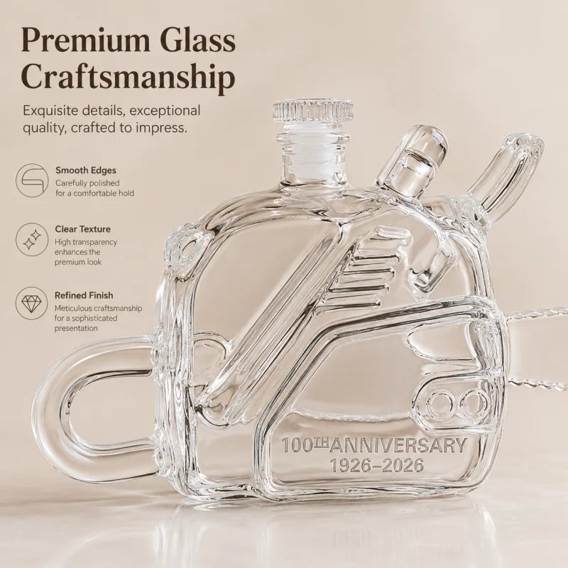 Veltora chainsaw-shaped glass whiskey decanter with 100th anniversary design, industrial style liquor bottle, empty spirits carafe.