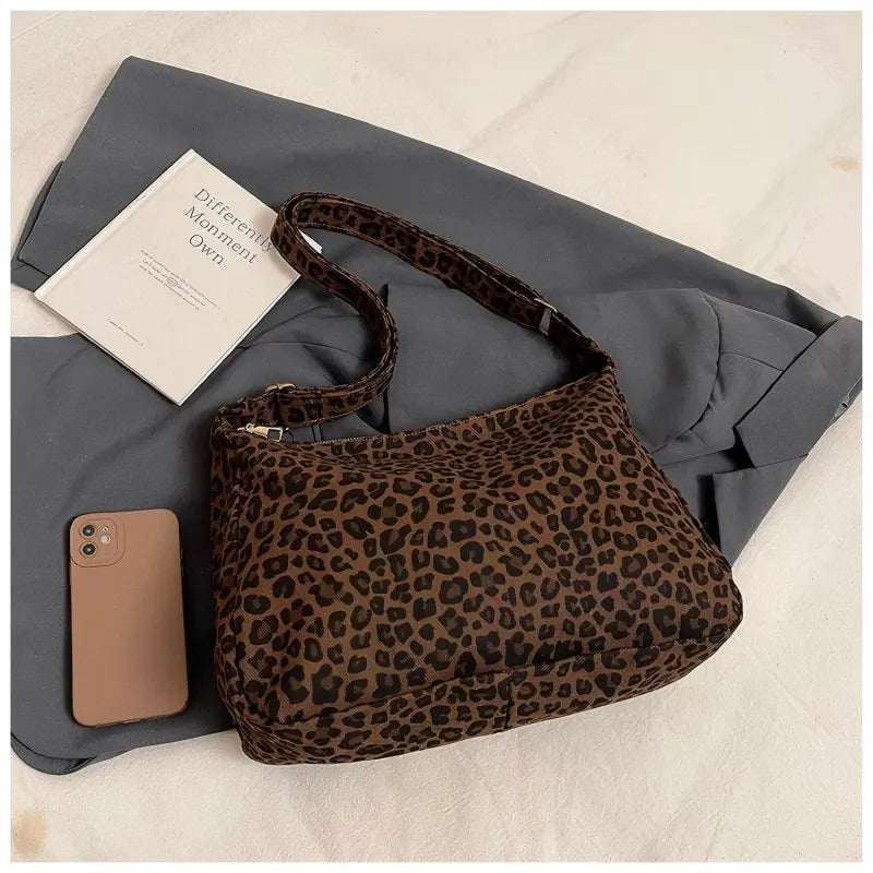 Veltora women's shoulder bag with leopard print, large capacity casual textile crossbody bag for commute and outings.