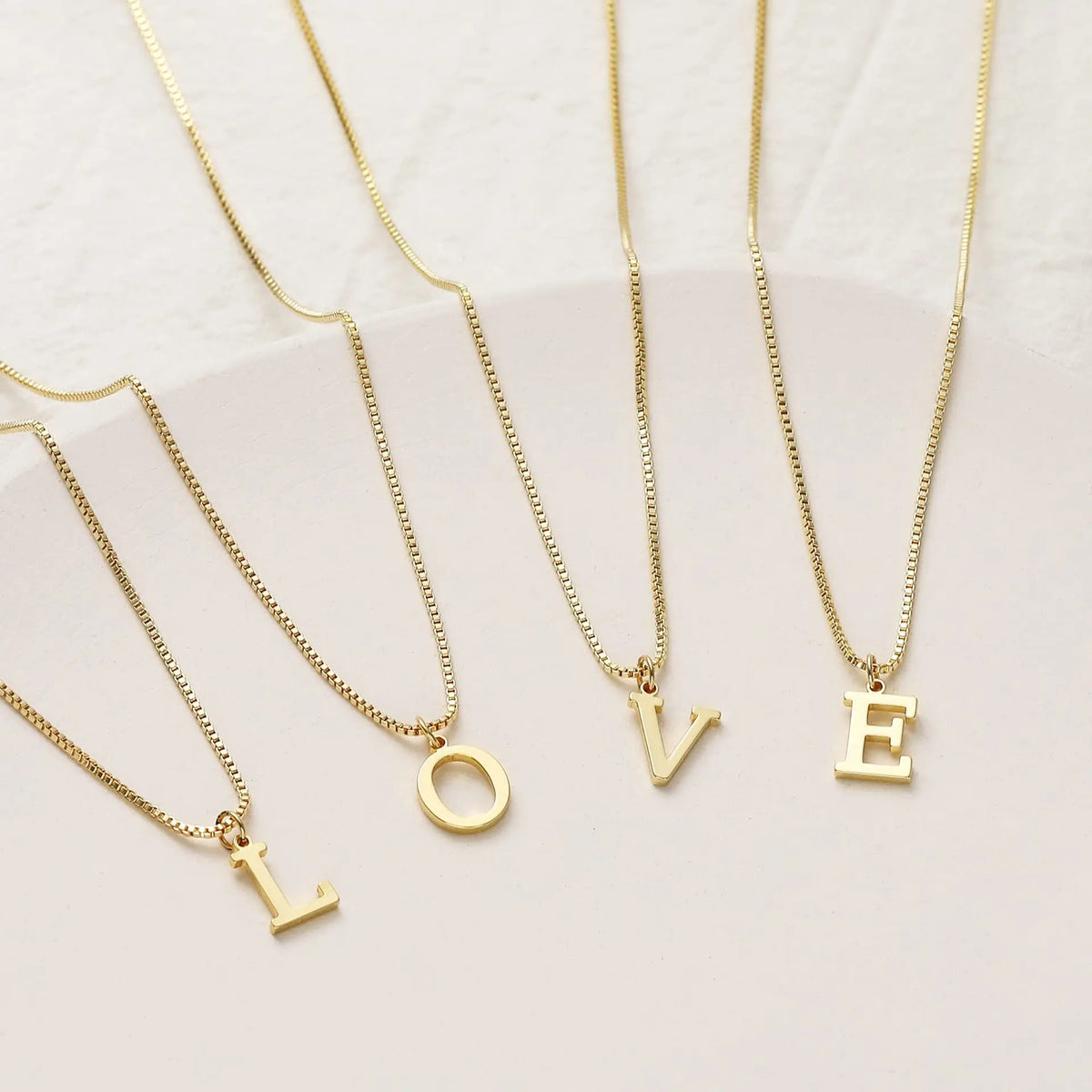 Veltora A-Z initial necklace in 18K gold plated stainless steel, featuring a cute letter pendant for women.