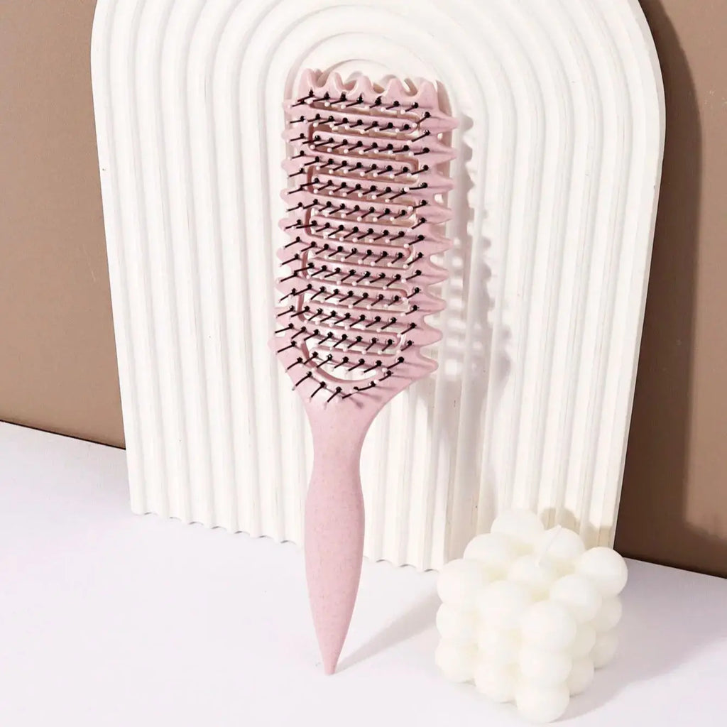 Veltora hollow massage styling brush with nylon mane and ABS plastic handle, designed for curling and styling real hair wigs.