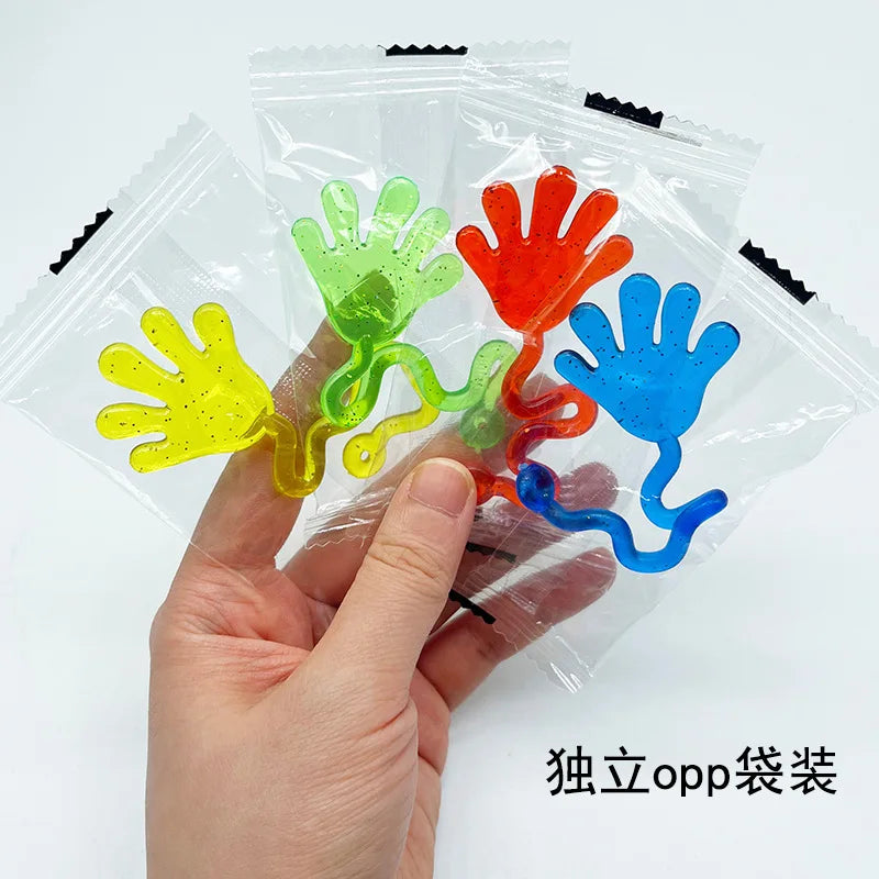 Set of 5-20 Veltora glitter sticky hands toys with elastic palms, squishy and fun for party favors and novelty gift supplies.
