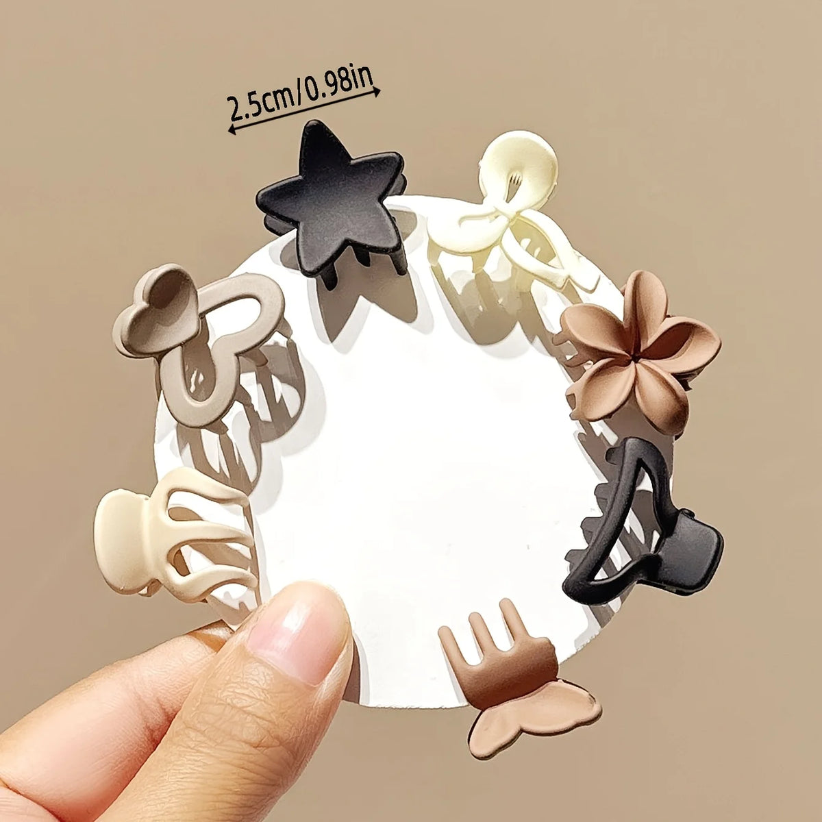 Set of beige mixed small clips from Veltora, cute girl accessories for daily use, occasions, or travel gifts, shown in the image.