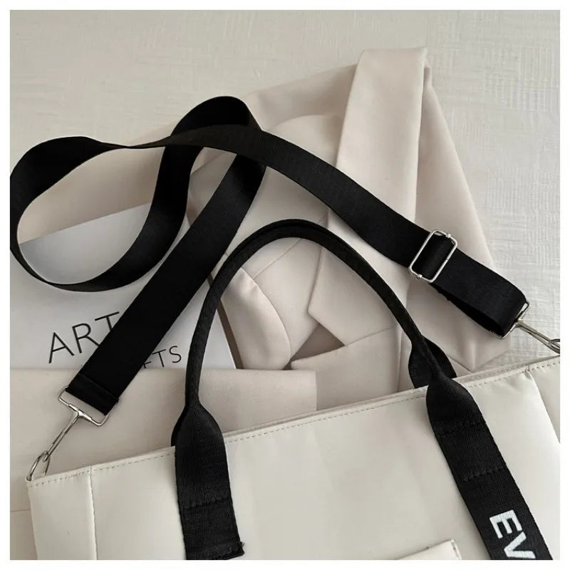 Veltora women's waterproof nylon tote bag with large capacity, lightweight crossbody design, ideal for work, travel, or gym use