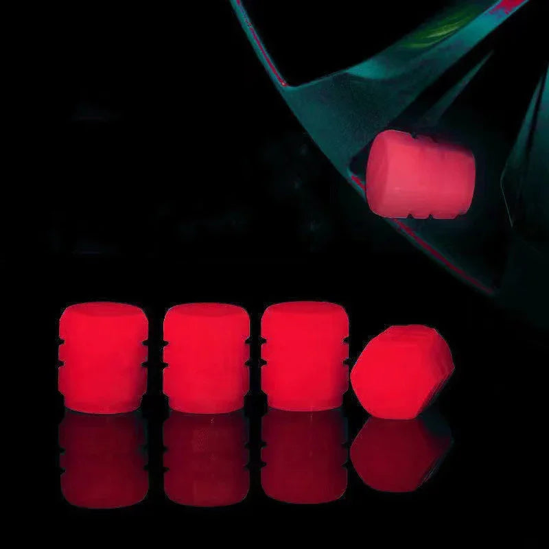 Veltora luminous fluorescent night car tire valve caps glowing in green and blue on motorcycle and bike wheels, decorative wheel nozzles.