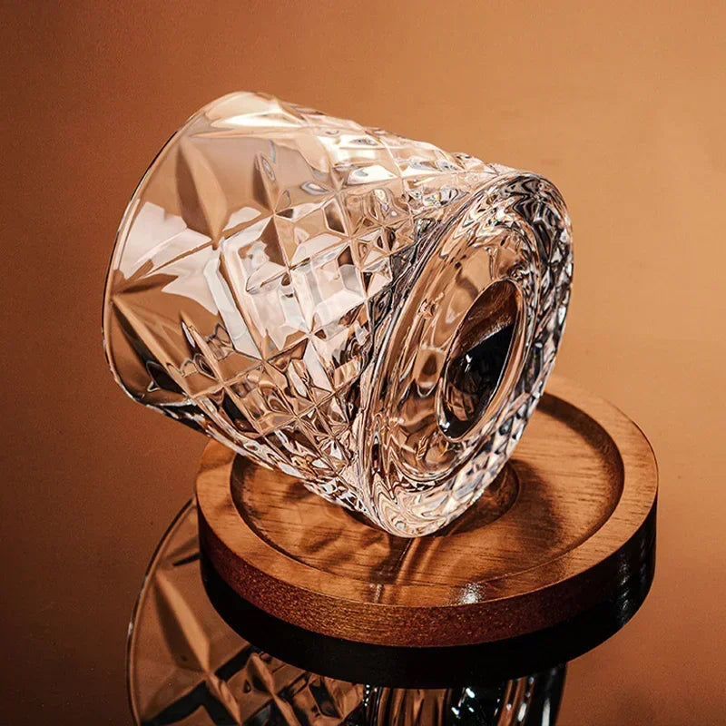 Veltora crystal whiskey tumbler with spinning base, elegant wine and brandy glass for bar and home drinkware.