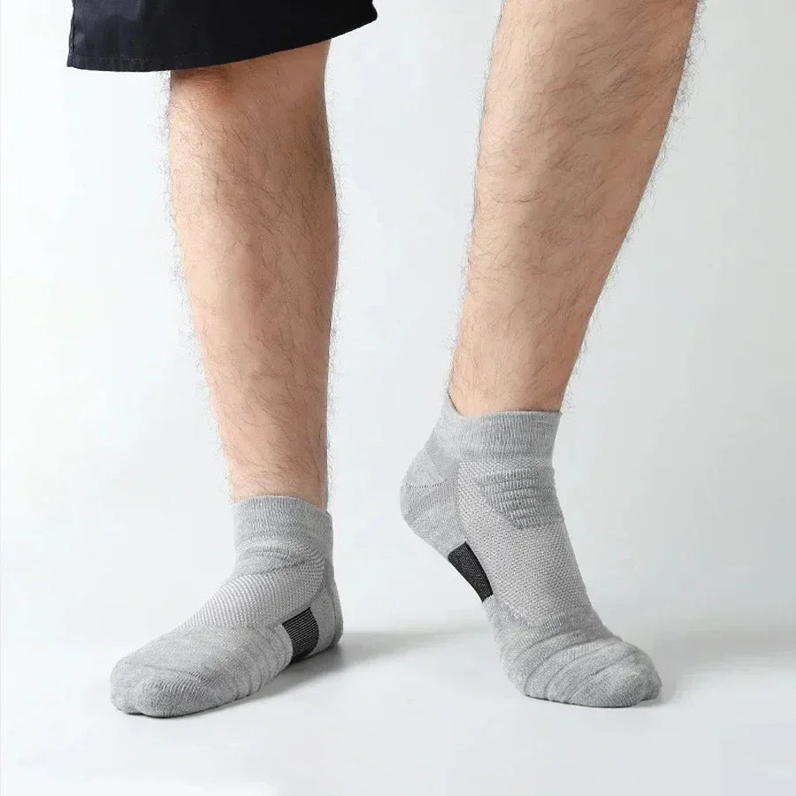 Veltora men's anti-slip football socks in black, short and long tube style, breathable cotton sport socks for soccer and basketball.