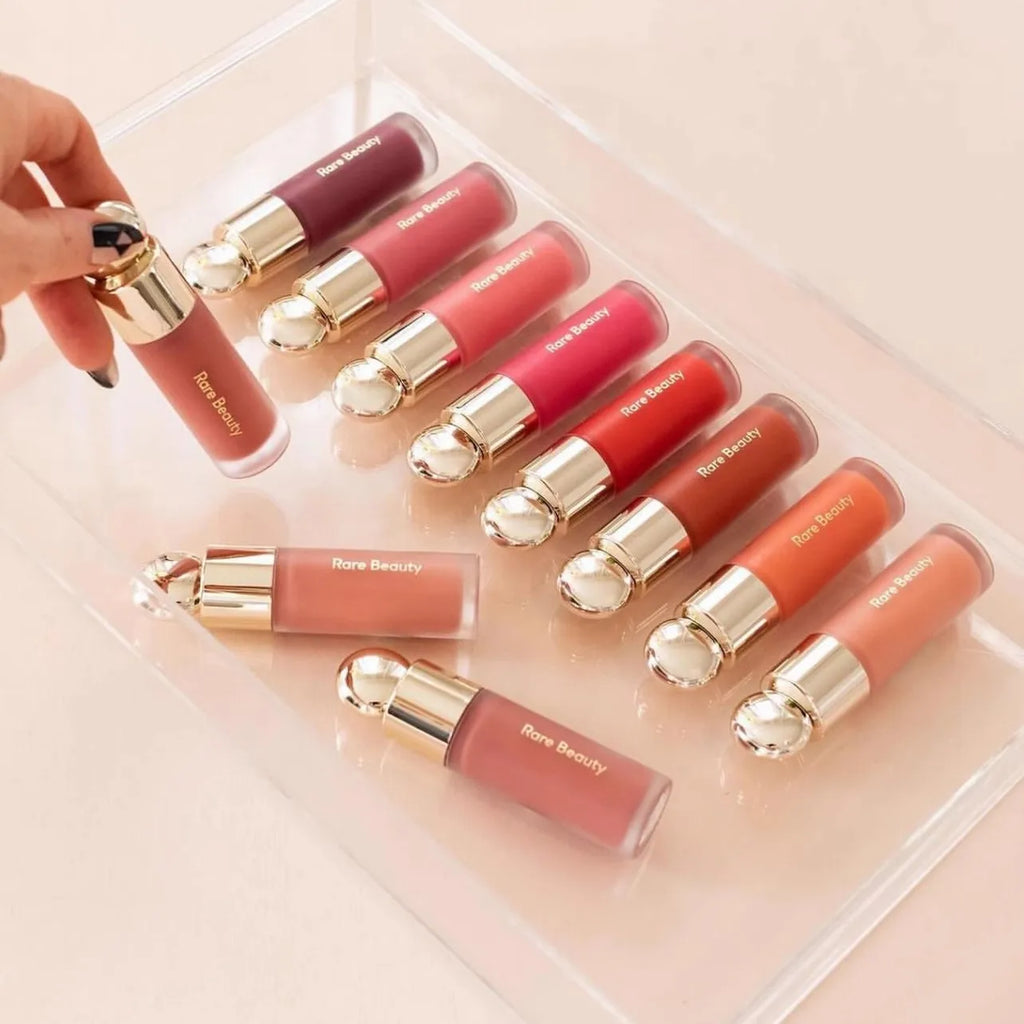 Veltora Rare Beauty Soft Pinch Liquid Blush in silky, long-lasting formula, applied on cheek with natural glow and smooth finish.