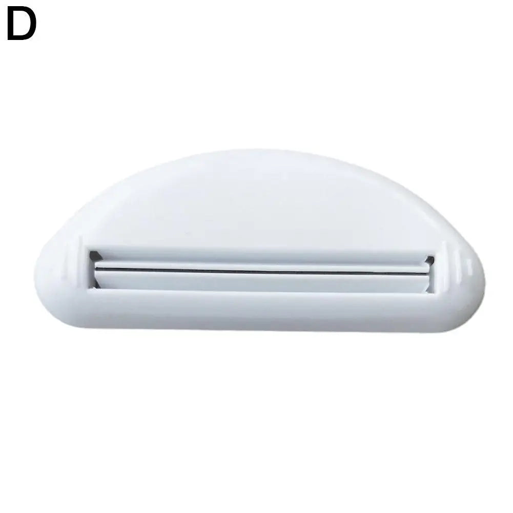 Veltora manual toothpaste dispenser and squeeze clamp for bathroom, used to extrude cream from tubes efficiently.