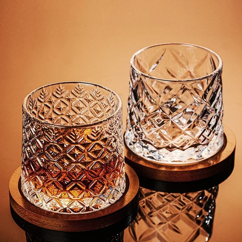 Veltora crystal whiskey tumbler with rotating base, spinning wine and brandy glass for bar or home drinkware.