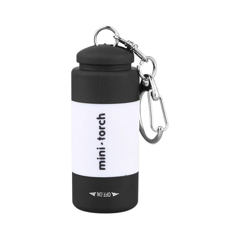 Veltora pocket keychain flashlight with waterproof design, mini LED light, USB rechargeable, ideal for outdoor hiking and camping.