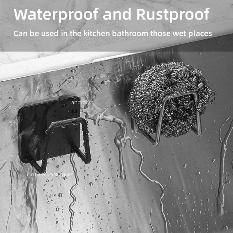Stainless steel sink sponge rack by Veltora with wire ball holder for draining sponges inside kitchen sink.