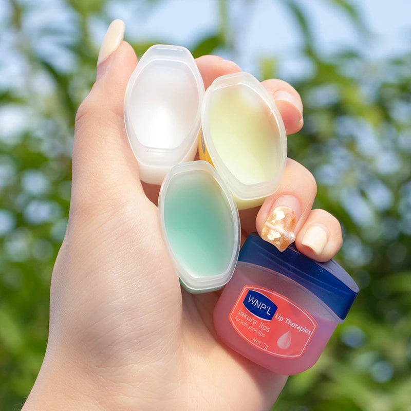 Veltora healing lip balm in a jar, moisturizing and nourishing all-natural lip mask for dry lips with a smooth, glossy finish.