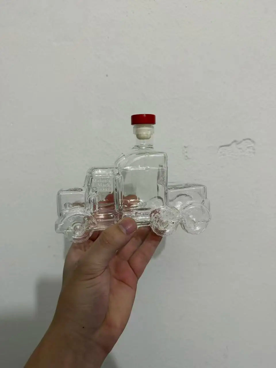 Veltora creative semi truck-shaped glass whiskey decanter with detailed design, ideal bourbon bottle for truck and whiskey enthusiasts.