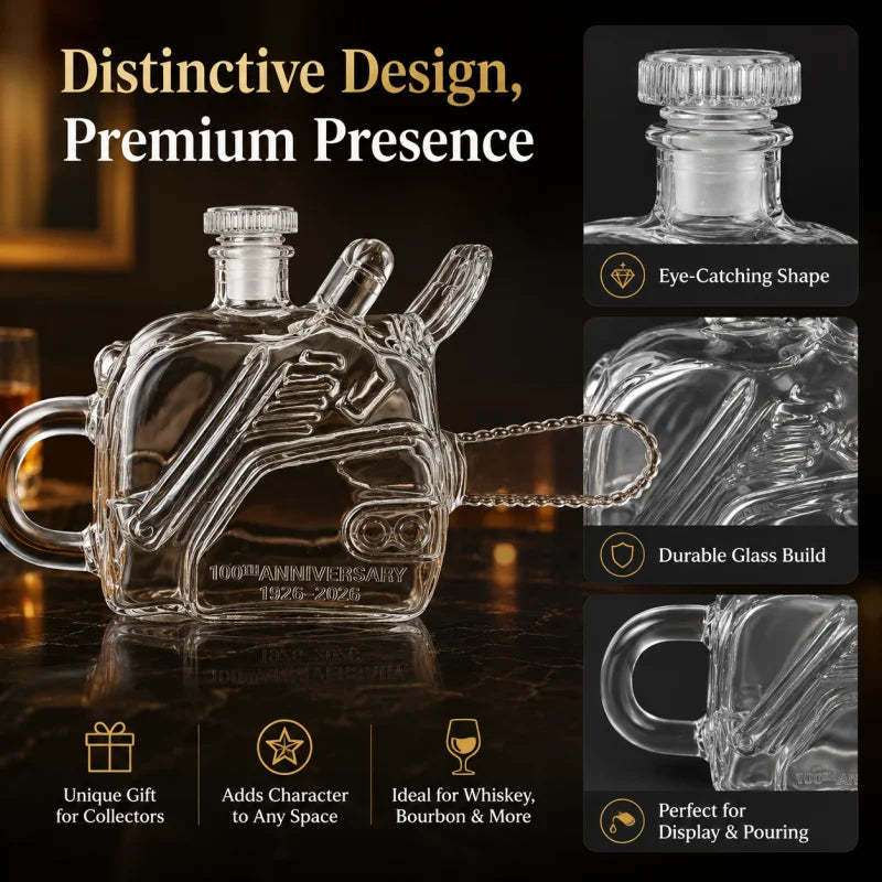 Veltora chainsaw-shaped glass whiskey decanter with 100th anniversary design, decorative liquor bottle for spirits display.