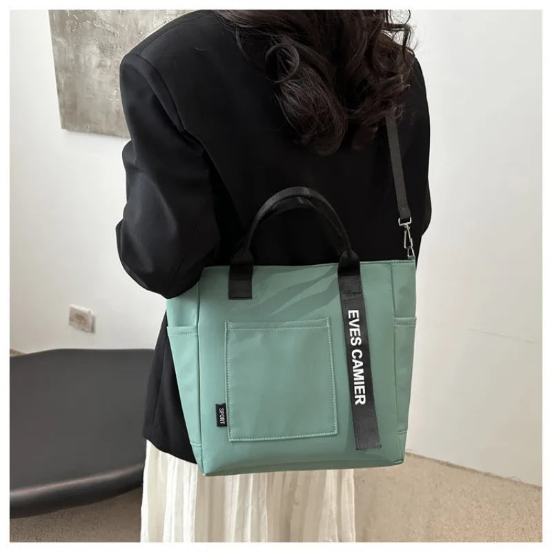 Veltora waterproof nylon tote bag for women, large capacity and lightweight crossbody style, ideal for student, work, travel, or gym use.