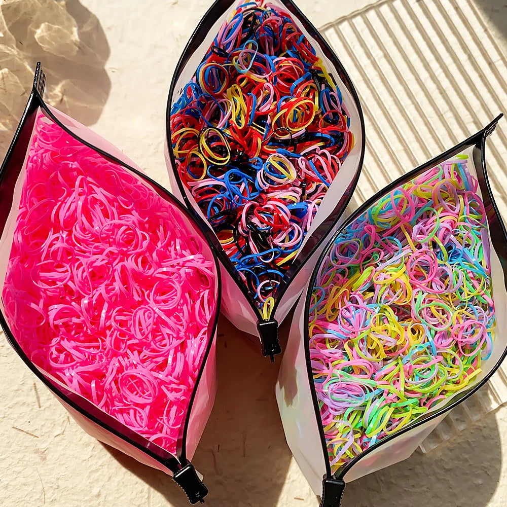 Colorful disposable rubber hair ties and headbands for girls, ideal for ponytails and kids' hair accessories by Veltora.