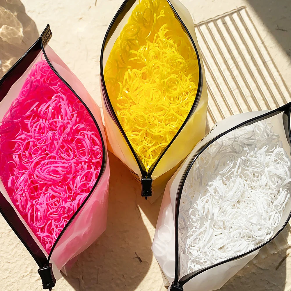 Set of colorful disposable rubber band hair ties and headbands for girls, children's ponytail holders, by Veltora.