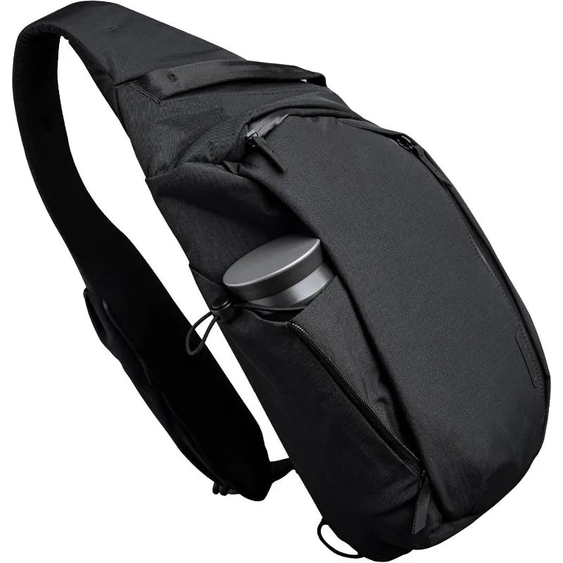 Veltora right shoulder chest bag, 7.5L crossbody sling backpack with tablet pocket and water bottle holder, black fabric.