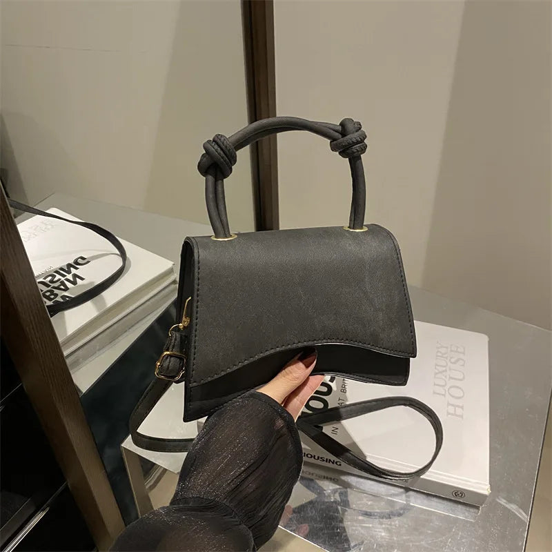Veltora women's shoulder bag in solid color, trendy small square crossbody bag with casual diagonal style for autumn use.
