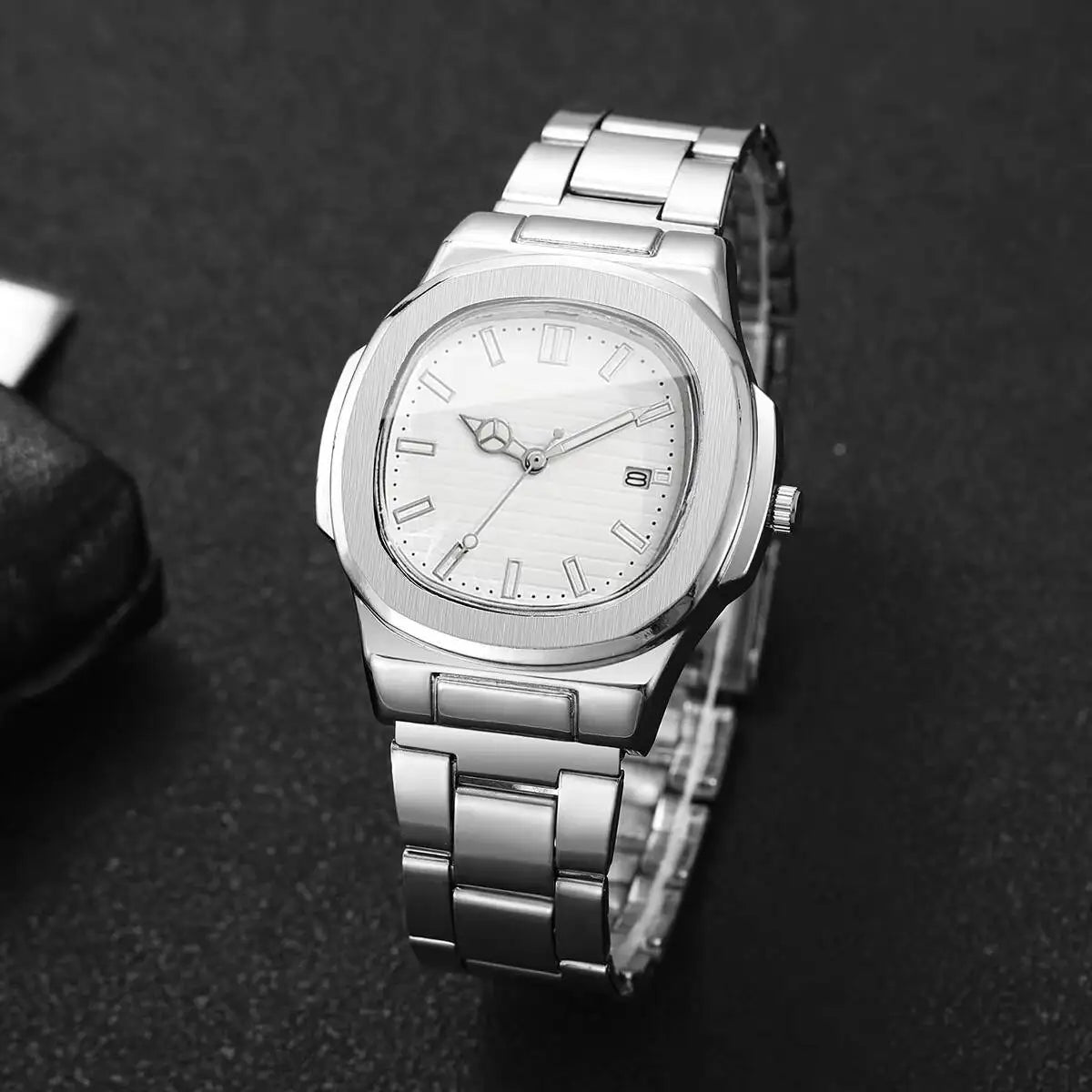 Veltora luxury men's business watch with square dial, stainless steel strap, quartz movement, and calendar display.