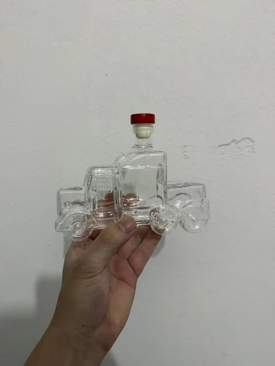 Veltora creative semi truck shaped glass whiskey decanter with a bourbon bottle design, perfect gift for truck enthusiasts and whiskey fans.