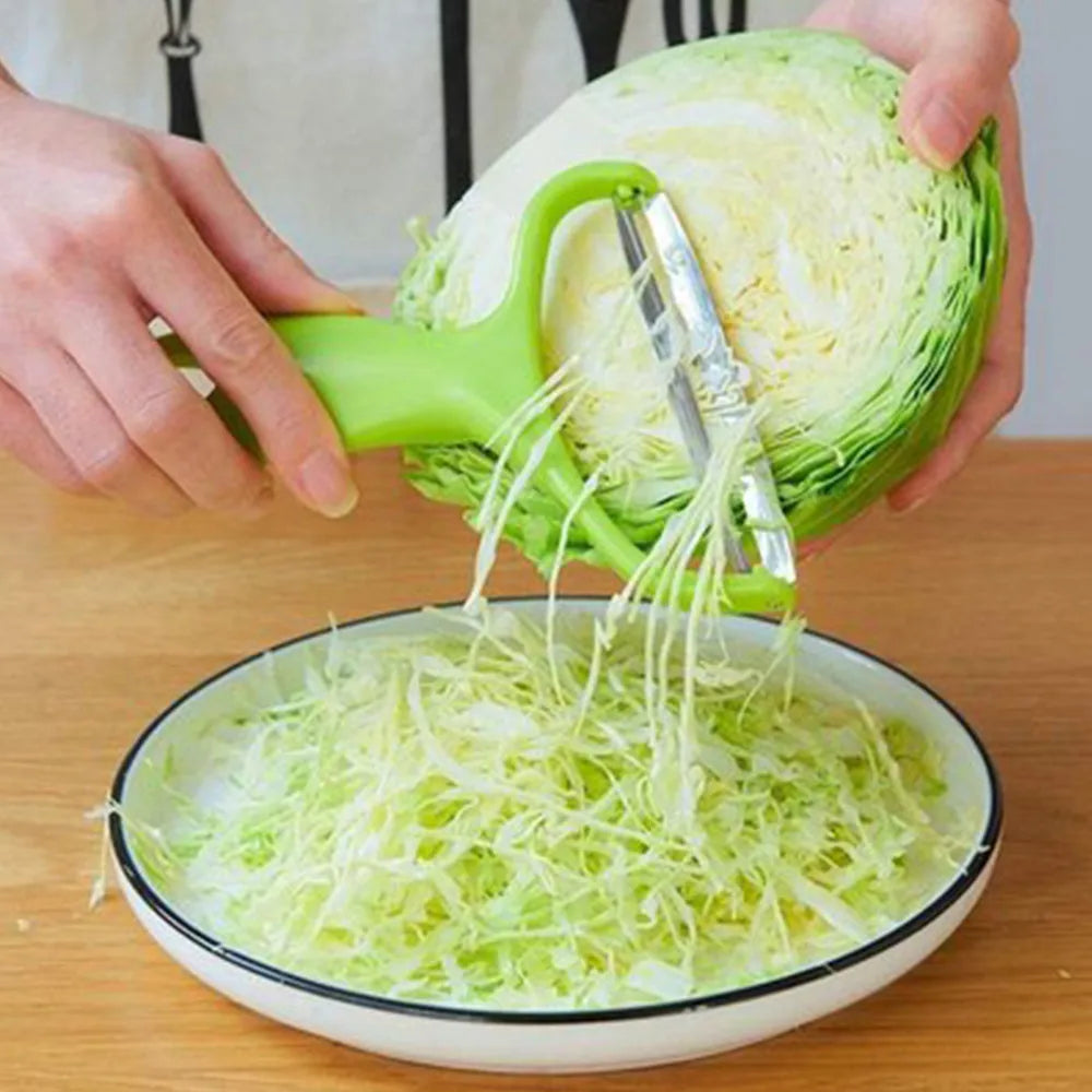Veltora cabbage slicer and vegetable cutter with grater for salads, potatoes, carrots, and cucumbers in a home kitchen setting.