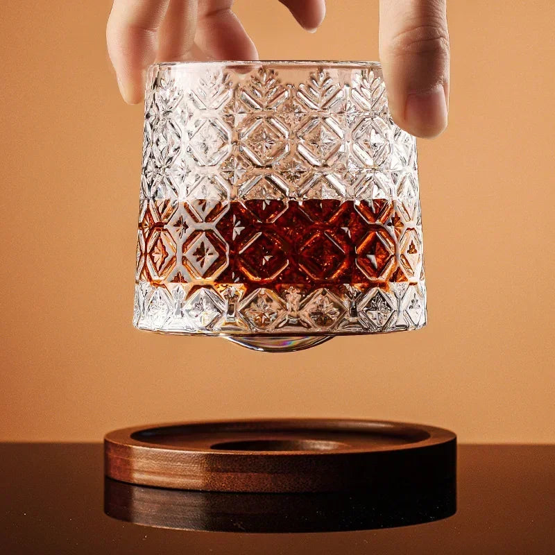 Veltora crystal whiskey glass with rotating base, elegant wine and brandy glass for bar or home drinkware, spinning tumbler design