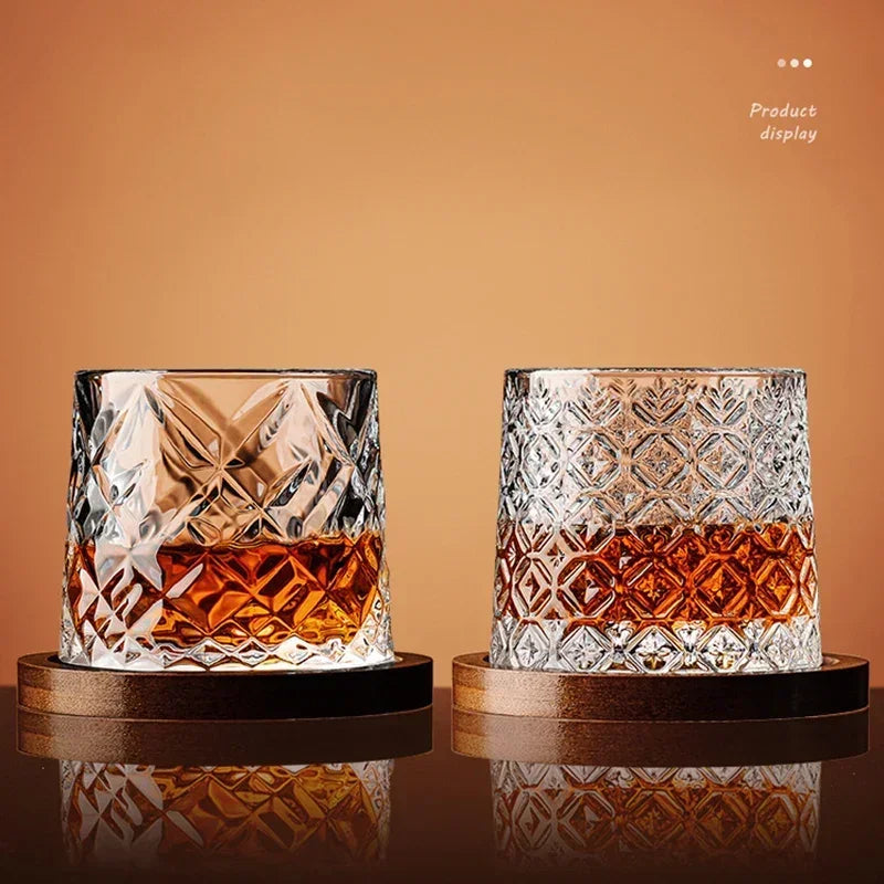 Veltora crystal whiskey tumbler with spinning base, rotating wine and brandy glass for bar or home use, elegant drinkware.