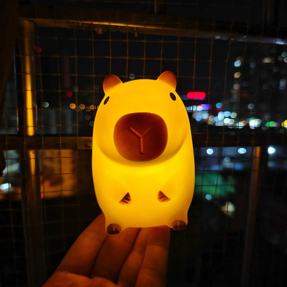 Veltora cute pet capybara night light, silicone cartoon bedside lamp for room decor and bedtime comfort.