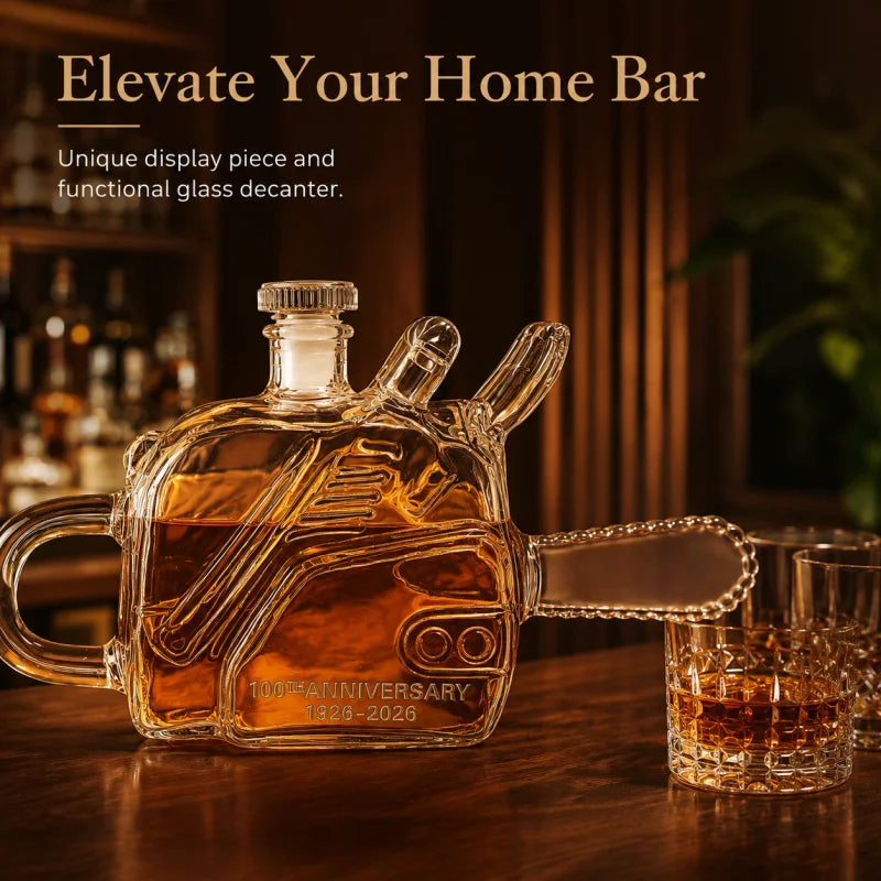 Veltora chainsaw-shaped glass whiskey decanter with 100th anniversary commemorative design, industrial-style liquor bottle, empty spirit carafe