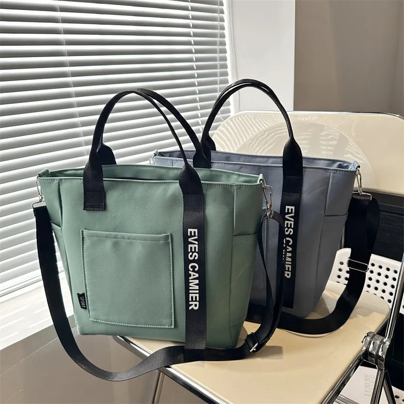 Veltora women's waterproof nylon tote bag with large capacity, lightweight crossbody design, ideal for students, work, travel, and gym.