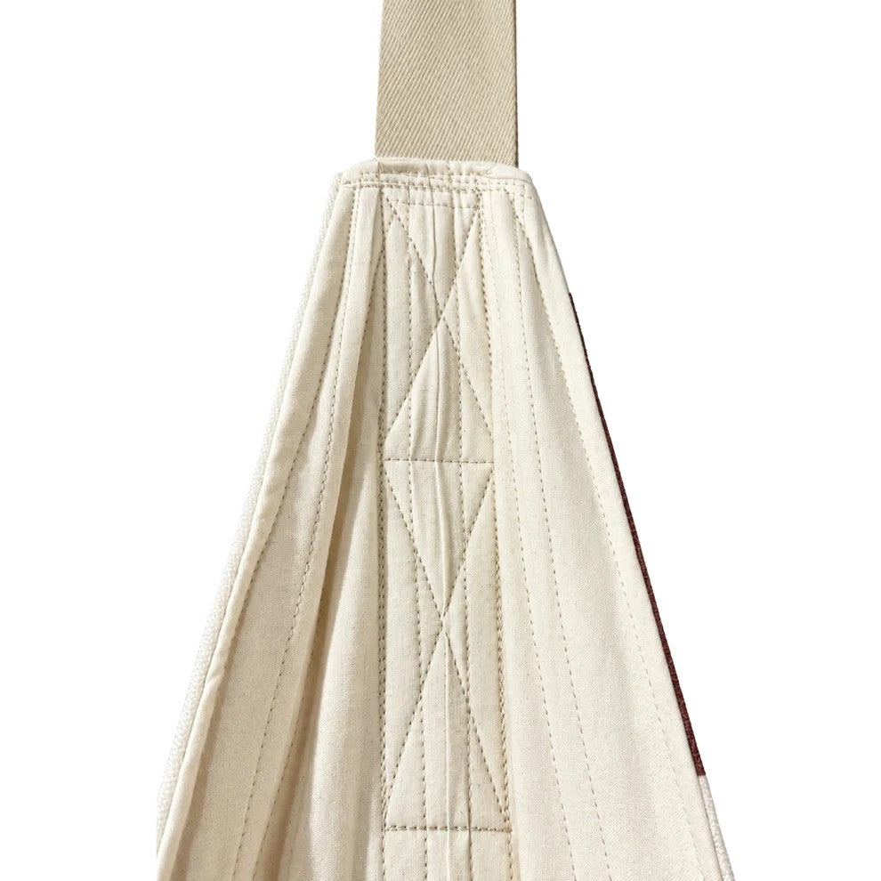 Kids' cocoon swing in cow design by bees&blooms, large XXL size, hangs with colorful ropes for indoor or outdoor play.