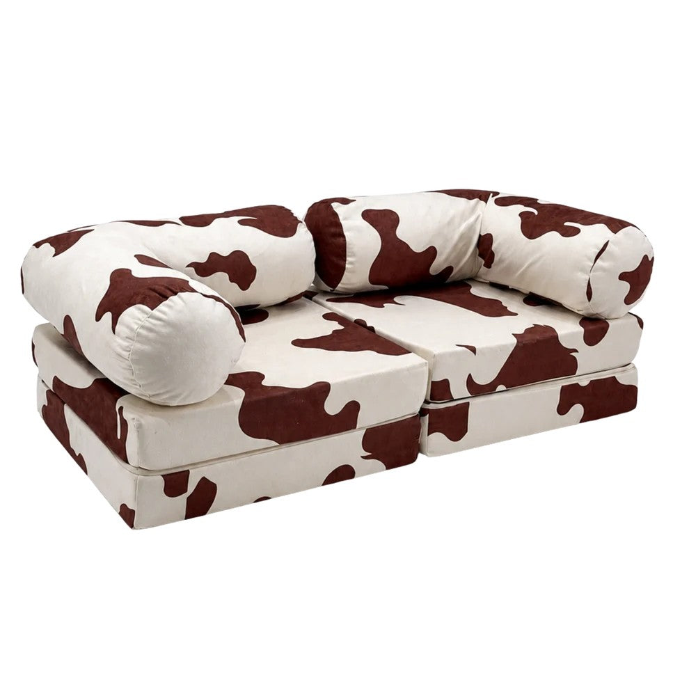Bees&blooms HoneyHug soft modular sofa for children featuring a cute cow design, perfect for cozy play and seating.