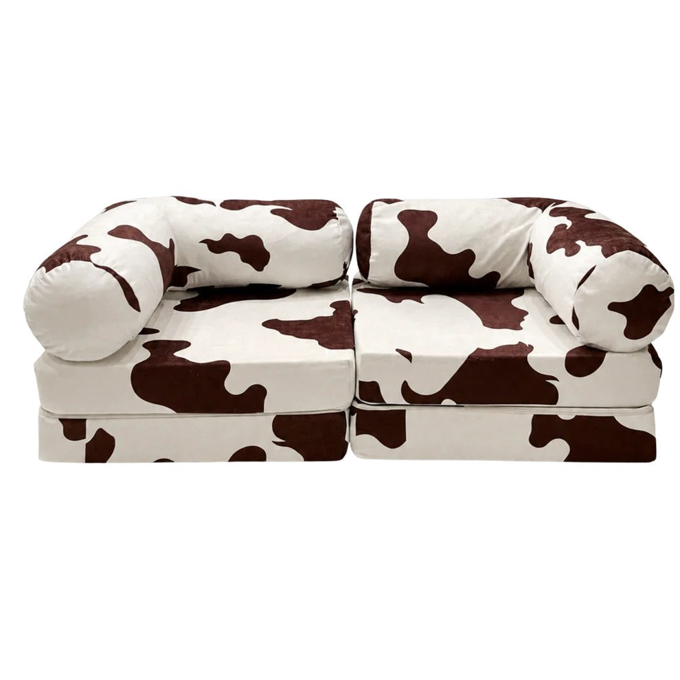Bees&blooms HoneyHug soft modular sofa for children in cow print, colorful cushioned seating for kids' playroom or nursery.