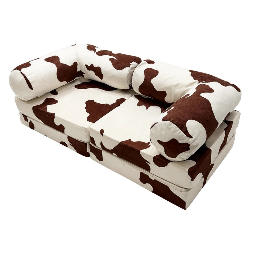 Bees&blooms HoneyHug soft modular children's sofa in cow design, featuring plush fabric and playful animal theme.