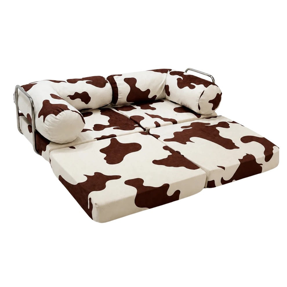 Bees&blooms HoneyHug soft modular children's sofa in cow print with plush fabric and flexible design for kids' playroom or lounge area.