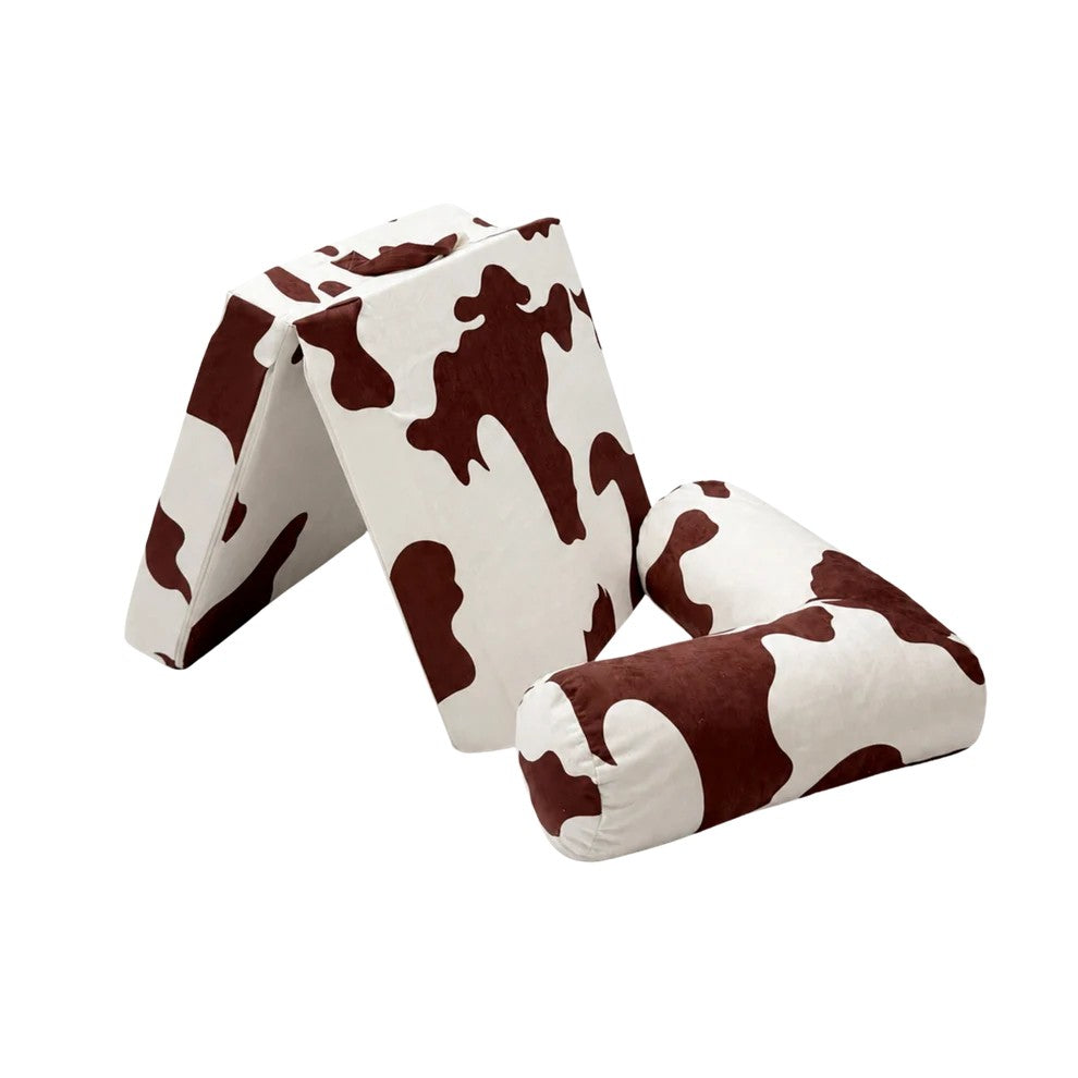 Bees&blooms HoneyHug soft modular children's sofa in cow print, featuring plush fabric and versatile design for cozy play and relaxation.