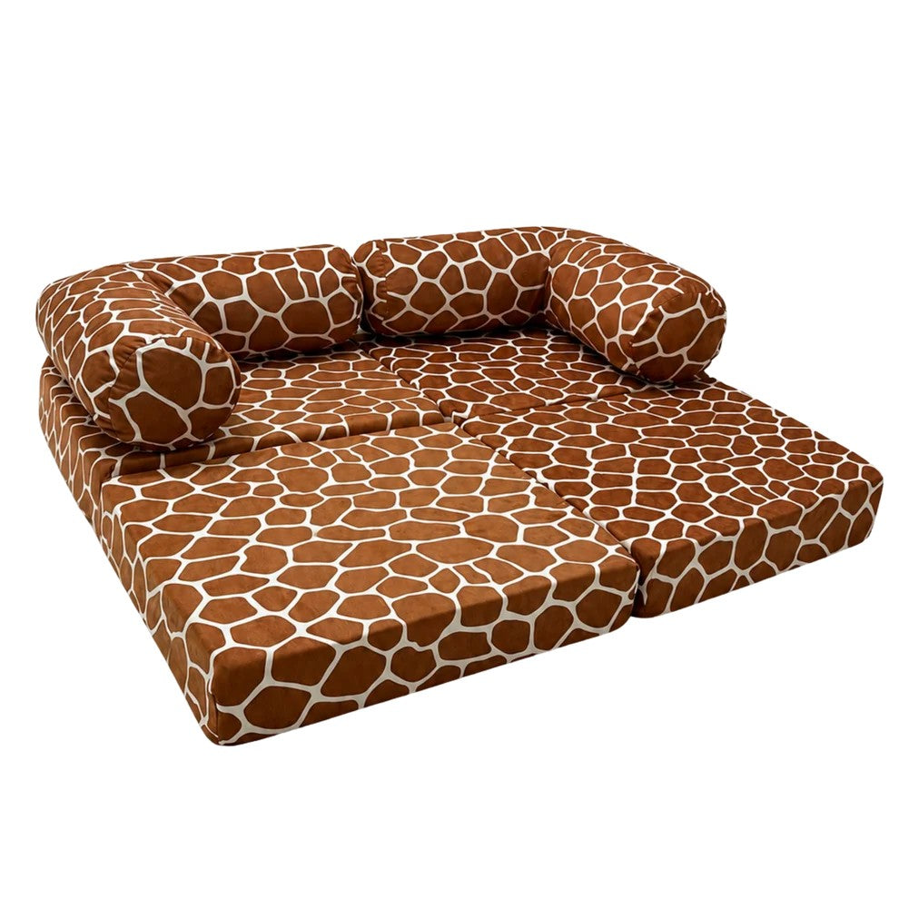 Bees&blooms HoneyHug soft modular children's sofa in giraffe print, cozy and colorful for kids' playroom or bedroom.
