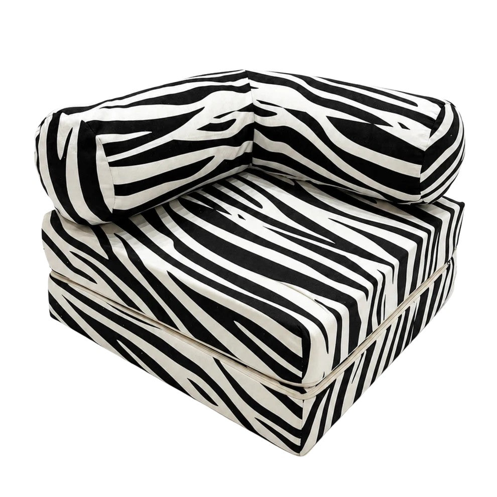 HoneyHug soft modular children's sofa by bees&blooms with zebra print, featuring plush, colorful cushions for cozy seating.