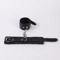 Black litchi-pattern handcuffs from Dropshipman, designed as couple punishment toys for intimate, highly suggestive play.