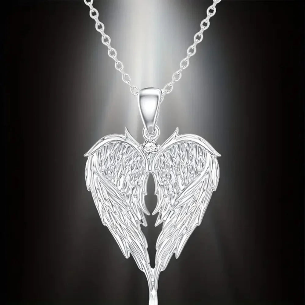 Hip-hop fashion feather angel wings heart inlay zircon pendant necklace for men and women, rock punk jewelry accessory.