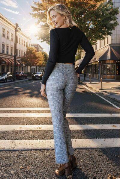 Heimish full size plaid flare pants with wide waistband, plus size, featuring a stylish plaid pattern and comfortable fit.