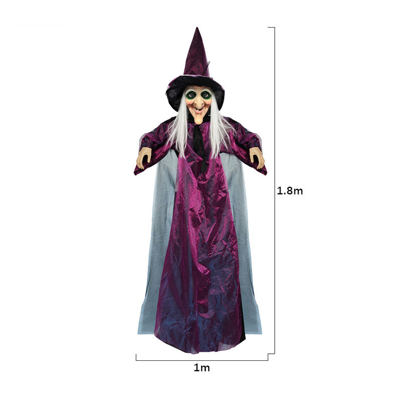 Life-size purple talking witch decoration with glowing eyes, animated voice-controlled Halloween outdoor spooky prop by eprolo.